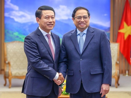 Premier de Vietnam recibe al viceprimer ministro de Laos - ảnh 1