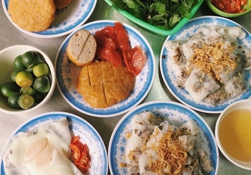 Business Insider presenta cinco restaurantes callejeros de Hanói con estrellas Michelin - ảnh 10