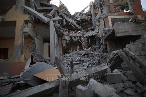Al menos 15 personas mueren en ataque aéreo israelí contra ciudad de Rafah - ảnh 1