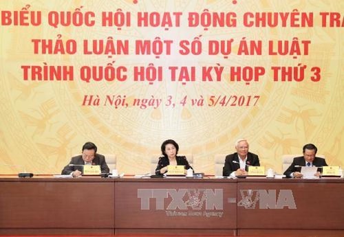 越南举行专职国会代表会议讨论《特别行政经济单位法》草案 - ảnh 1