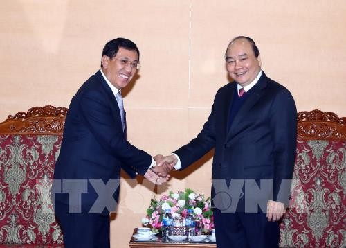 越南愿向老挝稳定并发展经济提供支持和帮助 - ảnh 1