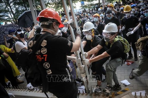 中国香港政府谴责极端暴力行为 - ảnh 1
