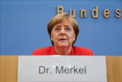 Angela Merkel pour le maintien des sanctions contre Moscou - ảnh 1
