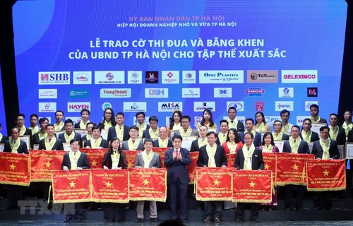 Près de 200 entreprises hanoiennes honorées - ảnh 1