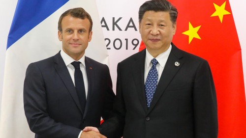 Climat: Emmanuel Macron et Xi Jinping réaffirment leur soutien à l'“irréversible” accord de Paris - ảnh 1