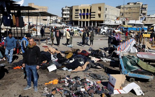 Irak : un double attentat suicide frappe un marché de Bagdad - ảnh 1