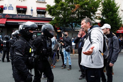 Covid-19: 114.000 manifestants en France contre le pass sanitaire - ảnh 1