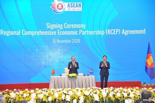 Le RCEP, le plus grand accord commercial au monde, entrera en vigueur le 1er janvier 2022 - ảnh 1