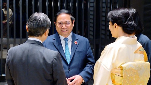 Le Premier ministre Pham Minh Chinh rencontre l’Empereur et l’Impératrice  du Japon - ảnh 1