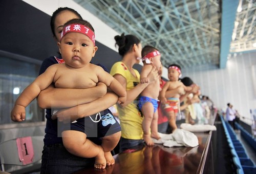 China’s population to reach 1.42 billion in 2020 - ảnh 1