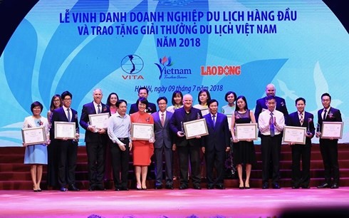 Winners of Vietnam Tourism Awards 2018 honoured - ảnh 1