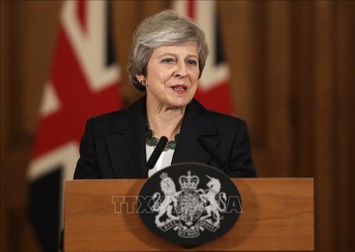 Theresa May vows to uphold draft Brexit deal - ảnh 1