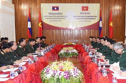 Unterzeichnung der Kooperation in Verteidigung zwischen Vietnam und Laos  - ảnh 1
