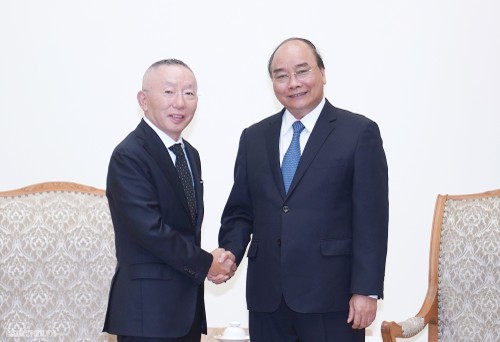 Premierminister Nguyen Xuan Phuc empfängt Vertreter des japanischen Konzerns Fast Retailing - ảnh 1