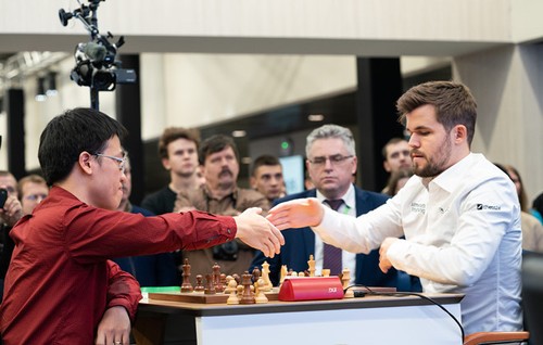 Le Quang Liem wird Schachweltmeister Magnus Carlsen treffen - ảnh 1