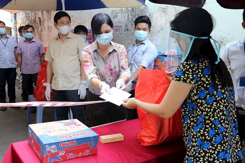 Gewährleistung der Sozialfürsorge ist Highlight Vietnams im Jahr 2021 - ảnh 1