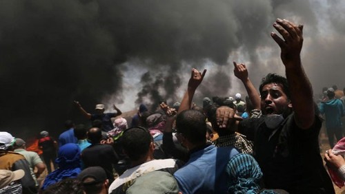 При столкновениях в секторе Газа пострадали тысячи палестинцев - ảnh 1