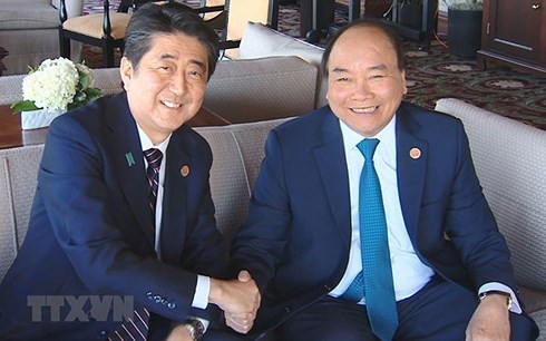 Премьер Вьетнама встретился с лидерами стран-участниц саммита G7 - ảnh 1