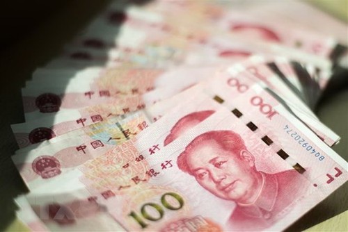 Россия и Китай обсуждают создание системы расчетов в рублях и юанях - ảnh 1