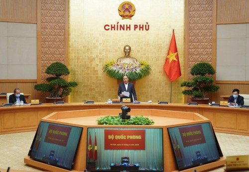 Заседание правительства Вьетнама по сценариям реагирования на эпидемию Covid-19 - ảnh 1