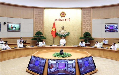 Вьетнам придерживается двойной цели – бороться с пандемией наряду с социально-экономическим развитием - ảnh 1