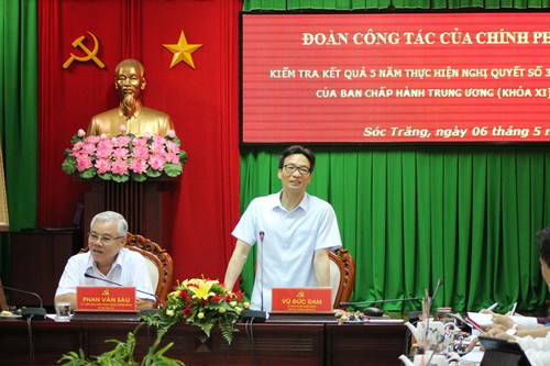 Deputi PM Vu Duc Dam melakukan temu kerja di Provinsi Soc Trang - ảnh 1