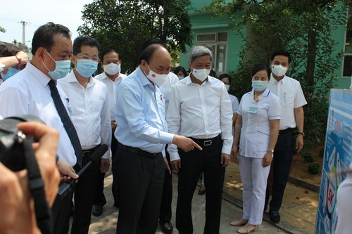 Presiden Nguyen Xuan Phuc Memeriksa Pekerjaan Pencegahan dan Penanggulangan Wabah Covid-19 di Kota Da Nang - ảnh 1