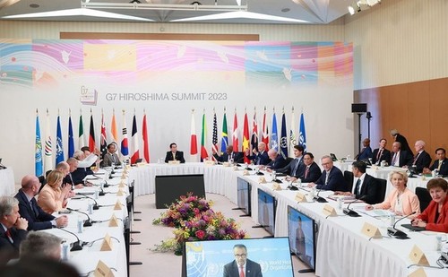 PM Pham Minh Chinh Hadiri KTT G7 yang Diperluas - ảnh 1