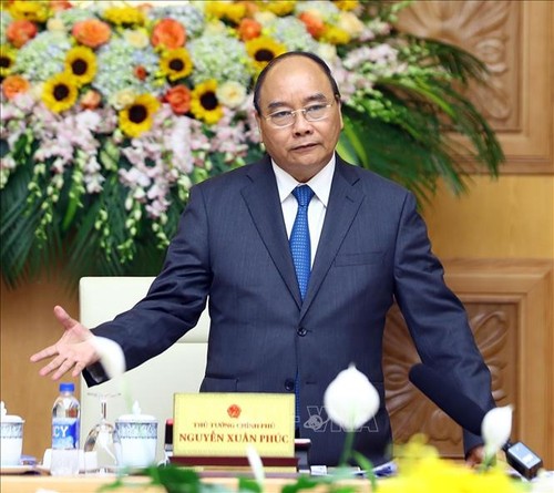 PM Nguyen Xuan Phuc: Administrasi melayani rakyat harus dicengkam di semua badan - ảnh 1