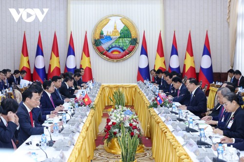 Vietnam dan Laos Bertekad untuk Tingkatkan Kerja Sama Ekonomi, Perluas Ruang Kerja Sama dan Pengembangan - ảnh 1