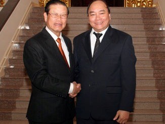 Laos Vizepremierminister trifft Vizepremierminister Nguyen Xuan Phuc - ảnh 1