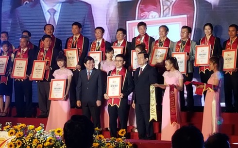 Staatspräsident nimmt an der Veröffentlichung des Titels “Hochwertige Waren Vietnams" teil - ảnh 1