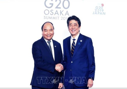 G20-Gipfel: Premierminister Nguyen Xuan Phuc nimmt an Aktivitäten im Rahmen des Treffens teil - ảnh 1