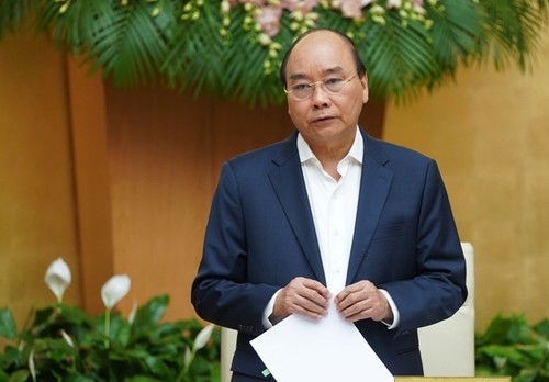 Premierminister Nguyen Xuan Phuc: Trotz Schwierigkeiten sind die Wirtschaft und Gesellschaft stabil - ảnh 1