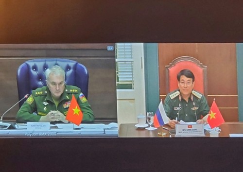 Zusammenarbeit zwischen der Politikabteilung der Armee Vietnams und der Politikabteilung der Streitkräfte Russlands - ảnh 1