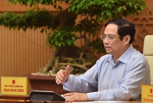 Premierminister Pham Minh Chinh: Vietnam gibt sich Mühe, um so schnell wie möglich Impfstoffe erfolgreich herzustellen - ảnh 1