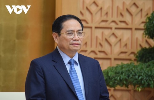 Premierminister Pham Minh Chinh leitet die Regierungssitzung im Februar - ảnh 1