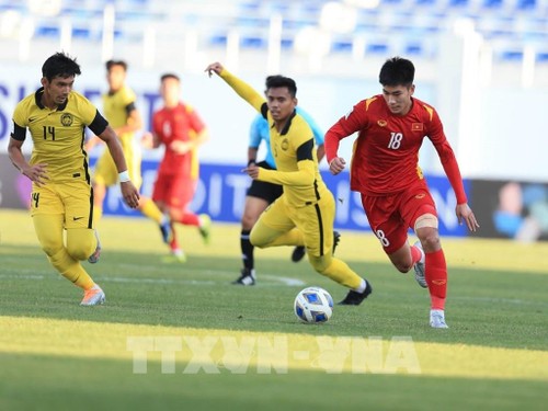 U23-Fußballasienmeisterschaft: Mit dem Sieg über Malaysia geht Vietnam ins Viertelfinale - ảnh 1
