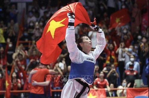 Vietnamesische Taekwondo-Kämpferin besiegt Taekwondo-Weltmeisterin - ảnh 1