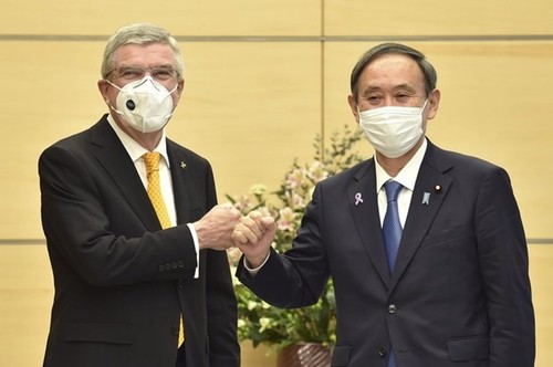 Jepang dan IOC sepakat mengadakan Olimpiade Tokyo sesuai dengan rencana - ảnh 1
