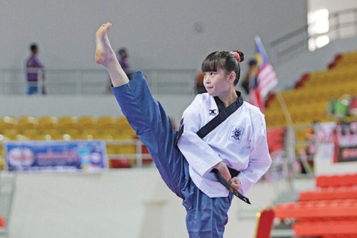 Mahasiswi Kamboja dan Kecintaannya terhadap Taekwondo - ảnh 1