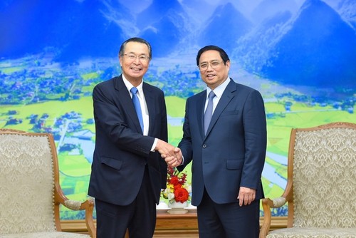 PM Pham Minh Chinh Terima Ishiguro Norihiko, Ketua Organisasi Promosi Dagang Jepang - ảnh 1