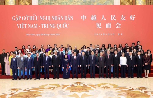 Ketua MN Vietnam, Vuong Dinh Hue Hadiri Pertemuan Persahabatan Rakyat Vietnam-Tiongkok - ảnh 2