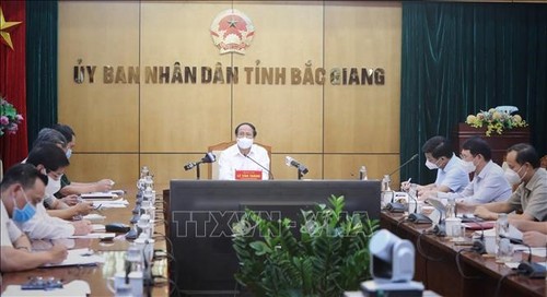 Provinsi Bac Giang Telah Pulihkan Produksi Sambil Memperhebat Pencegahan dan Pengendalian COVID-19 - ảnh 1