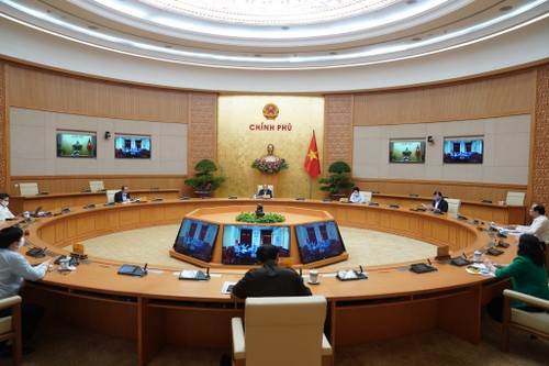 越南政府常务委员会举行会议 讨论新冠肺炎疫情防控工作 - ảnh 1