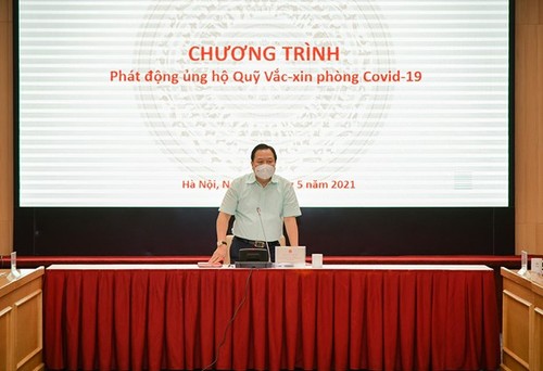 越南企业国有资本管理委员会的各家集团、总公司向新冠疫苗基金捐款2.3万亿越盾 - ảnh 1