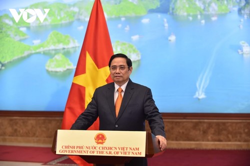 越南政府总理范明政在2021年全球服务贸易峰会上的讲话（全文） - ảnh 1
