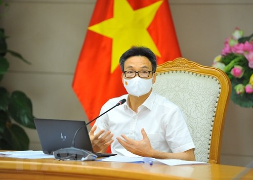 越南政府副总理武德担与胡志明市市委领导人座谈 - ảnh 1