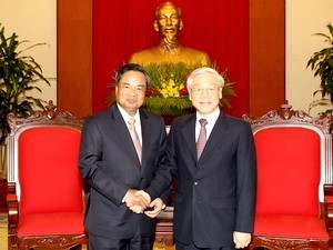 Party leader Trong receives Laotian Party’s Organization Committee delegation - ảnh 1