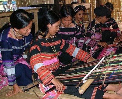 Woman weaving; Central Highlands, Vietnam, Woman weaving; M…